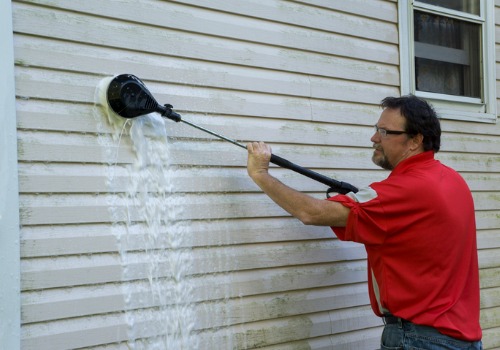 Cleaner performing Siding Cleaning in Dunlap IL